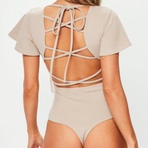 MISSGUIDED Nude flared sleeve lace up back body
